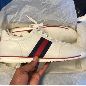 Men’s Gucci sneakers, size 12 never worn.
